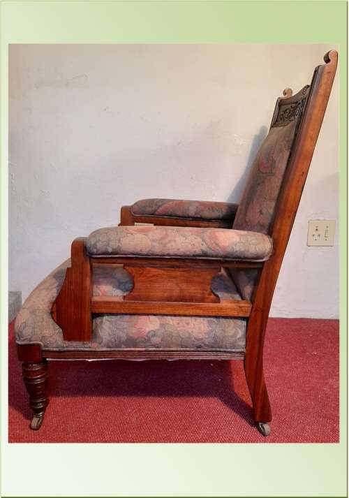 ANTIQUE EDWARDIAN GRANDFATHER CHAIR ON CASTORS  SOLID TEAK