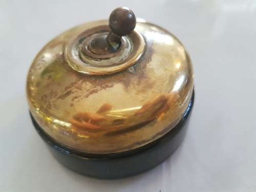 A Brass and Ceramic Light Switch SLICK Vitreous 1/5709