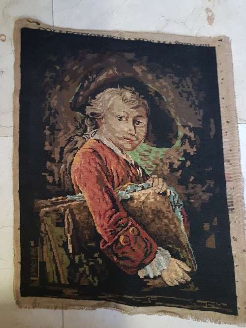 Stunning! A large unframed tapestry of a young boy holding a book