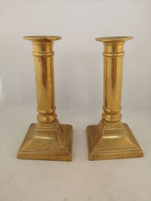 A Pair of Brass Candle Stick Holders