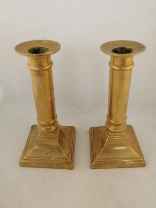 A Pair of Brass Candle Stick Holders