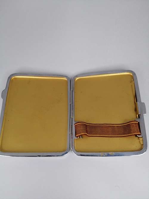 WHITE METAL ENGIN TURNED CIGARETTE BOX WITH IMAGE OF AN IRIS