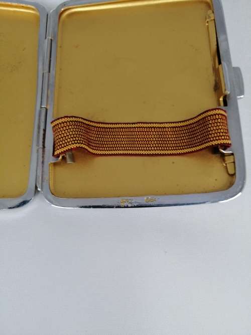 WHITE METAL ENGIN TURNED CIGARETTE BOX WITH IMAGE OF AN IRIS