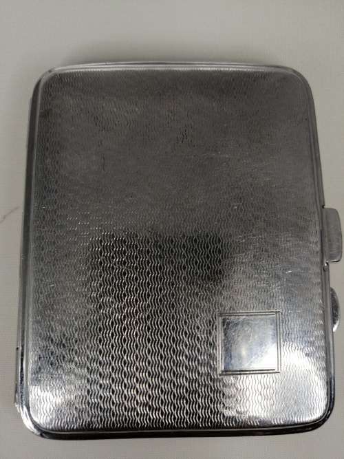 WHITE METAL ENGIN TURNED CIGARETTE BOX WITH IMAGE OF AN IRIS