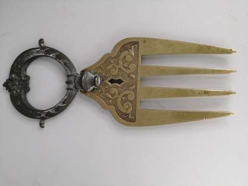 A RARE 4  PRONGED WMF BREAD FOLK