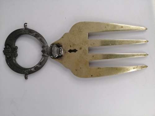 A RARE 4  PRONGED WMF BREAD FOLK