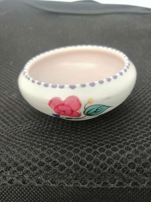 TWO POOLE TRINKET BOWLS ,ONE HAND DECORATED CICA 1952 AND THE OTHER SMALLER ONE CIRCA 1970