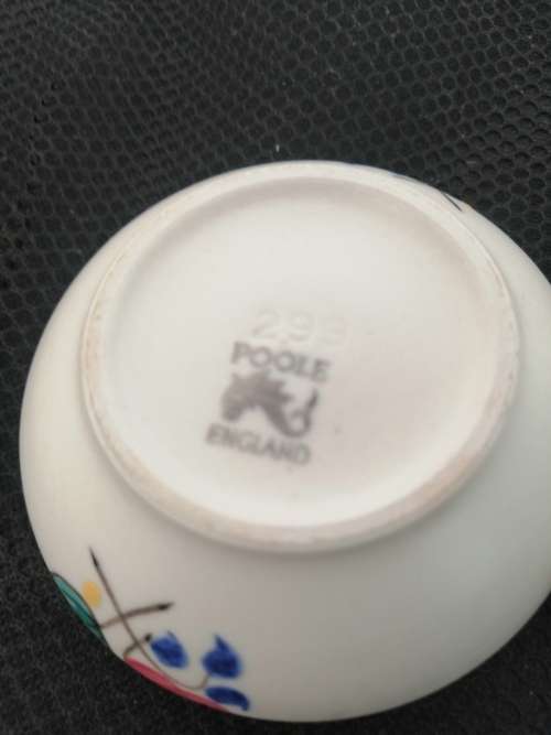 TWO POOLE TRINKET BOWLS ,ONE HAND DECORATED CICA 1952 AND THE OTHER SMALLER ONE CIRCA 1970