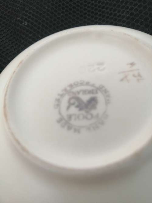 TWO POOLE TRINKET BOWLS ,ONE HAND DECORATED CICA 1952 AND THE OTHER SMALLER ONE CIRCA 1970