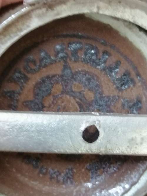 A LANCASTRIAN POTTERY BUD CASE IN AN EPNS HOLDER