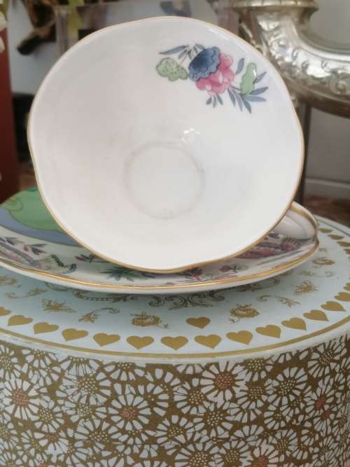 A BOXED WEDGEWOOD`THE TEA STORY COLLECTION` NEVER USED CUP AND SAUCER