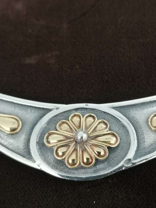 A CLASSY STERLING SILVER AND 22K GOLD NECKLACE