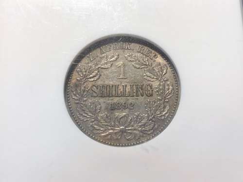 Very nice 1892 ZAR 1 shilling silver coin graded AU50 by NGC - Looks Undergraded