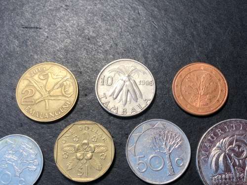 Thematic collection of coins with a PLANT design - price is for all 11 coins in the collection