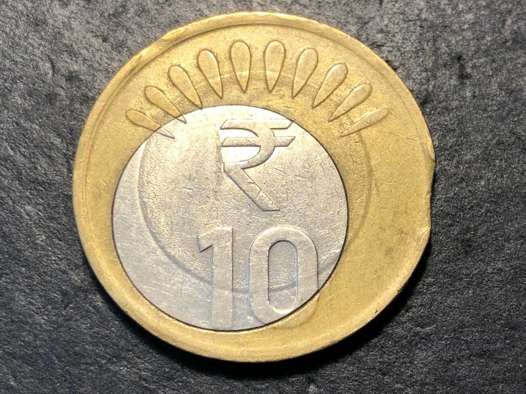 Extremely Rare Double Error 10 rupees coin - Off-centre core and clipped planchet
