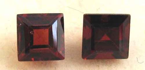 2 pieces of 6.00 x 6.00mm Princess cut  Garnets T. W. 2.38 ct
