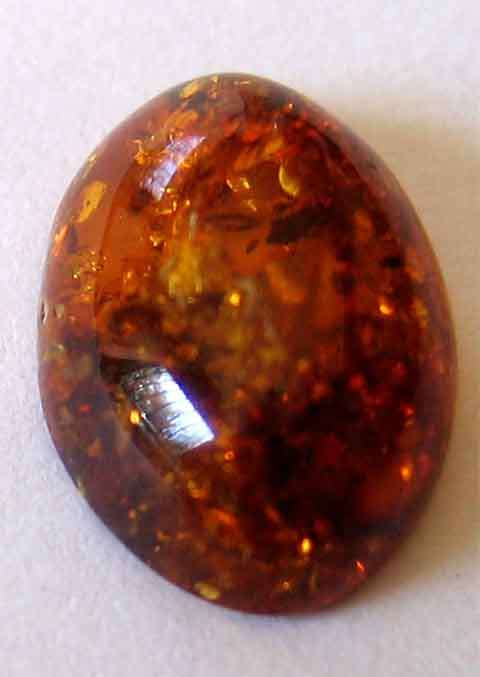 10.00 x 8.00 mm oval Amber 1.06 ct.