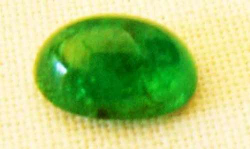 6.00 x 4.00 mm oval  CAB. Emerald 0.57 CT.