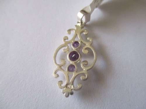 925 Sterling Silver and Genuine Amethysts Pendant.
