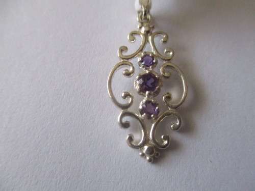 925 Sterling Silver and Genuine Amethysts Pendant.