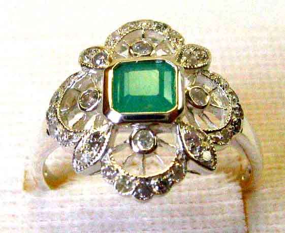 Genuine Sterling Silver, Emerald  and Diamonds Ring.