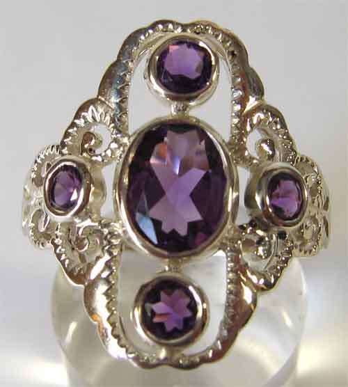 Lovely, Sterling Silver  and  Genuine Amethysts  Ring.