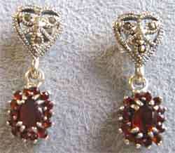Cute, pair of Sterling Silver and Garnets Earrings.