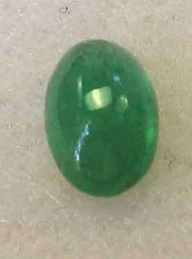 Genuine 6.90 x 4.00 mm Oval Cabachon cut Emerald  ).49 ct.