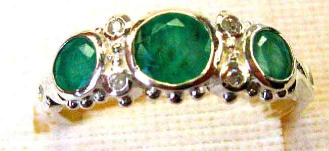 Genuine Emeralds and Diamonds in Sterling Silver Ring.