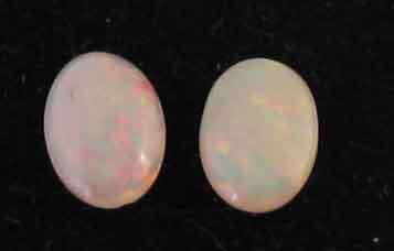 2 pieces -6.00 x 4.00 mm Oval Solid Opals , T. W. 0.48 ct.