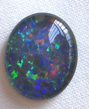 Genuine , 11.00 x 9.00 mm Oval  cut Triplet Opal 2.48 cts.