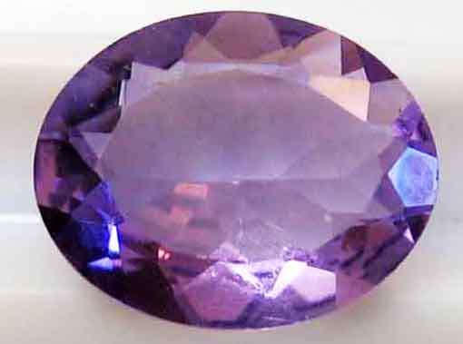 10.00 X 8.00 MM OVAL CUT AMETHYST 2.36 CT.