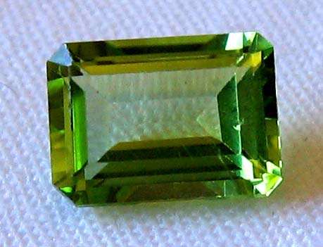7.00 x 5.00 mm Emerald - faceted  cut  Peridot , 1.18cts
