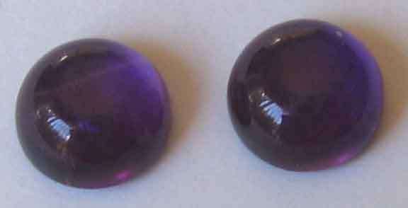 1 lot, 2 pieces  6.00  mm Round Cabochon cut Amethysts, T. W. 1.62  cts.