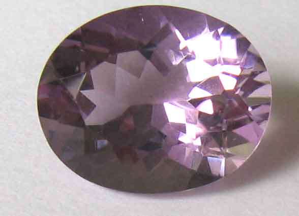 11.10 x 9.10 mm Oval -fancy cut Amethyst 3,13 cts,
