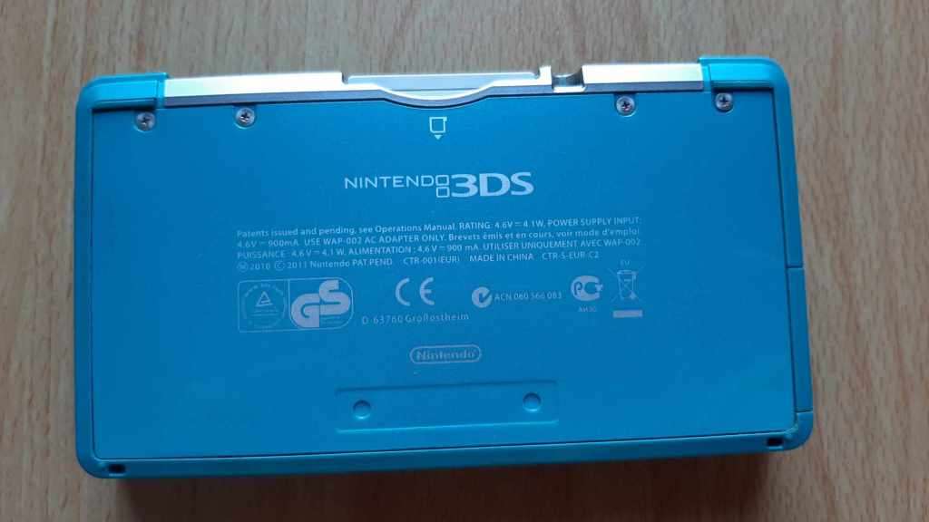 Nintendo 3ds console with original charger