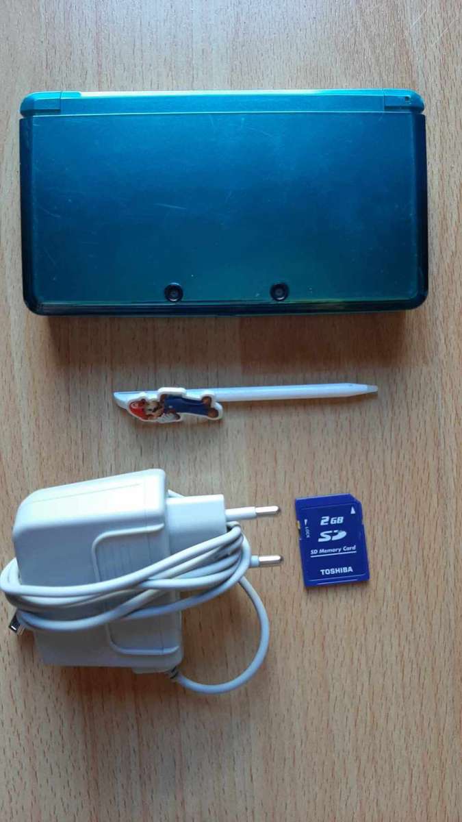 Nintendo 3ds console with original charger