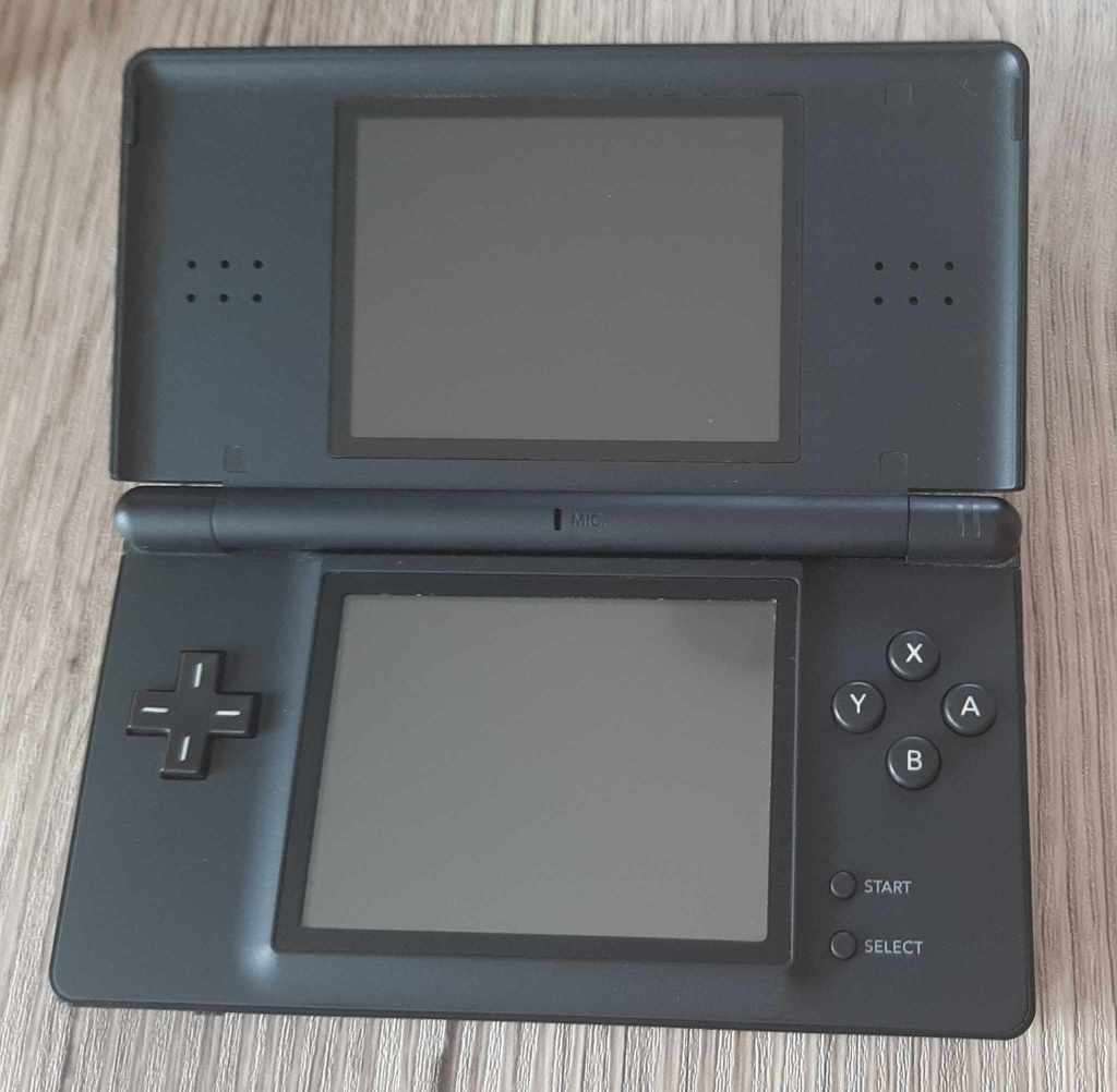 Nintendo ds lite console with charger and games
