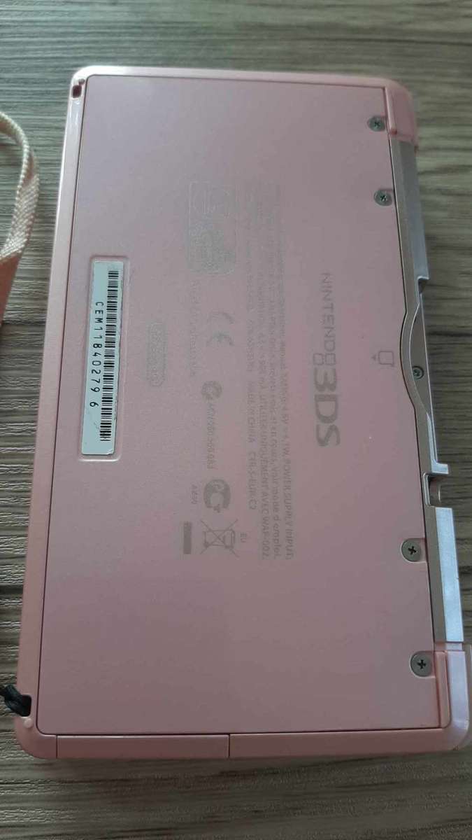 Nintendo 3ds console with original charger 3 games charging dock and case