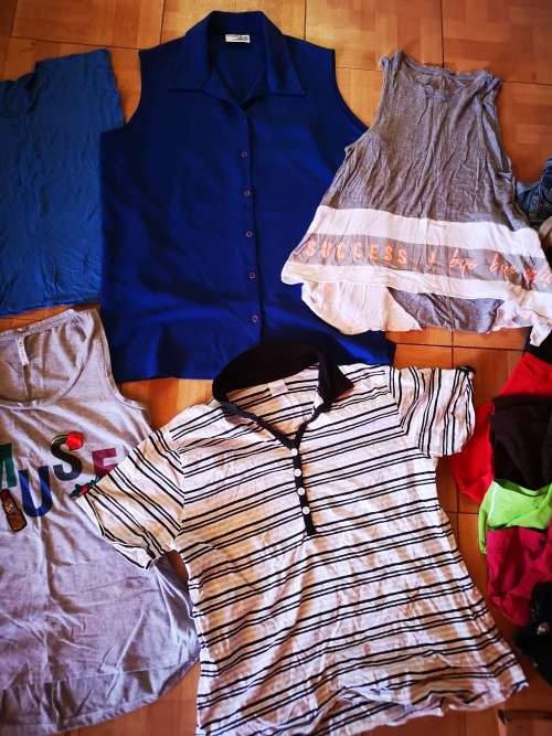 Large lot of women's clothing. Different sizes.