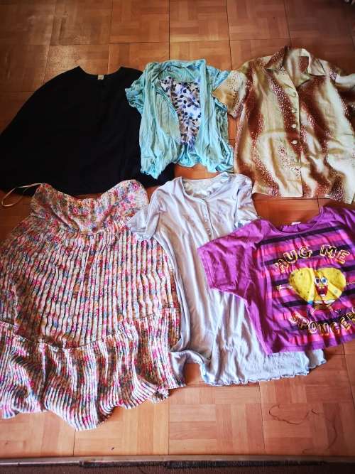 Large lot of women's clothing. Different sizes.