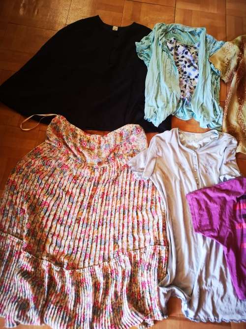 Large lot of women's clothing. Different sizes.