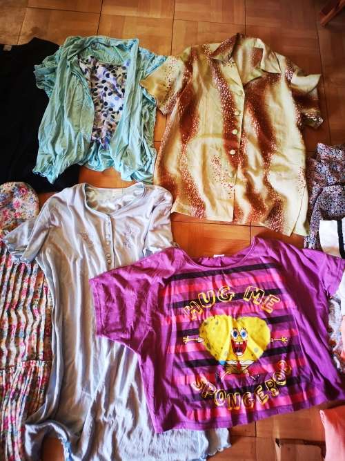 Large lot of women's clothing. Different sizes.