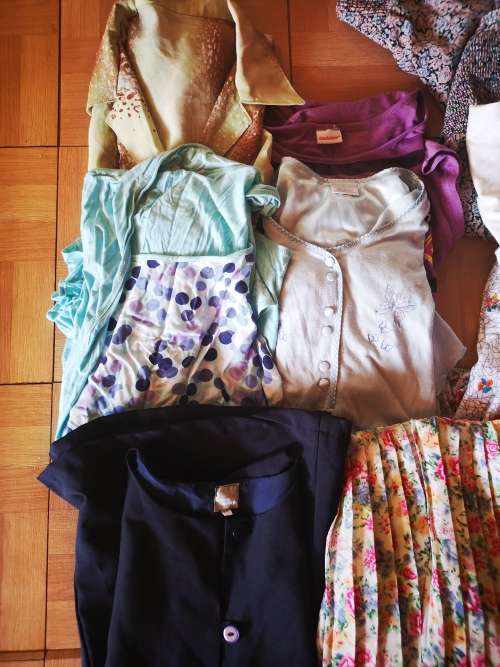 Large lot of women's clothing. Different sizes.