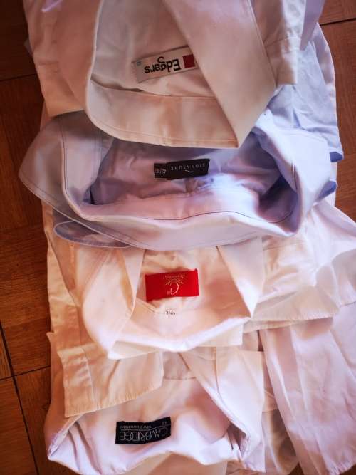 Large lot of men's clothing. Different sizes.