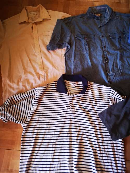 Large lot of men's clothing. Different sizes.