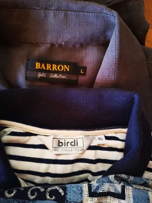 Large lot of men's clothing. Different sizes.