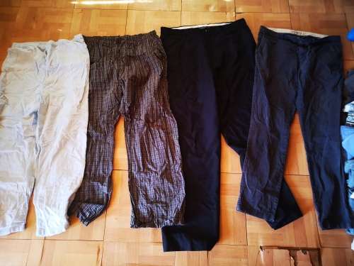 Large lot of men's clothing. Different sizes.