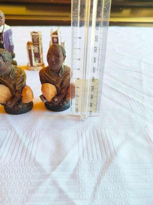11 very collectable chess pieces from the Nelson Mandela chess set by Gala Starr CC