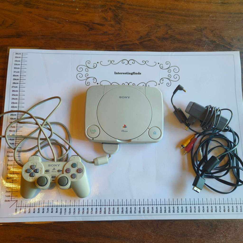 Original Sony Playstation one (PS one) with original controller and cables